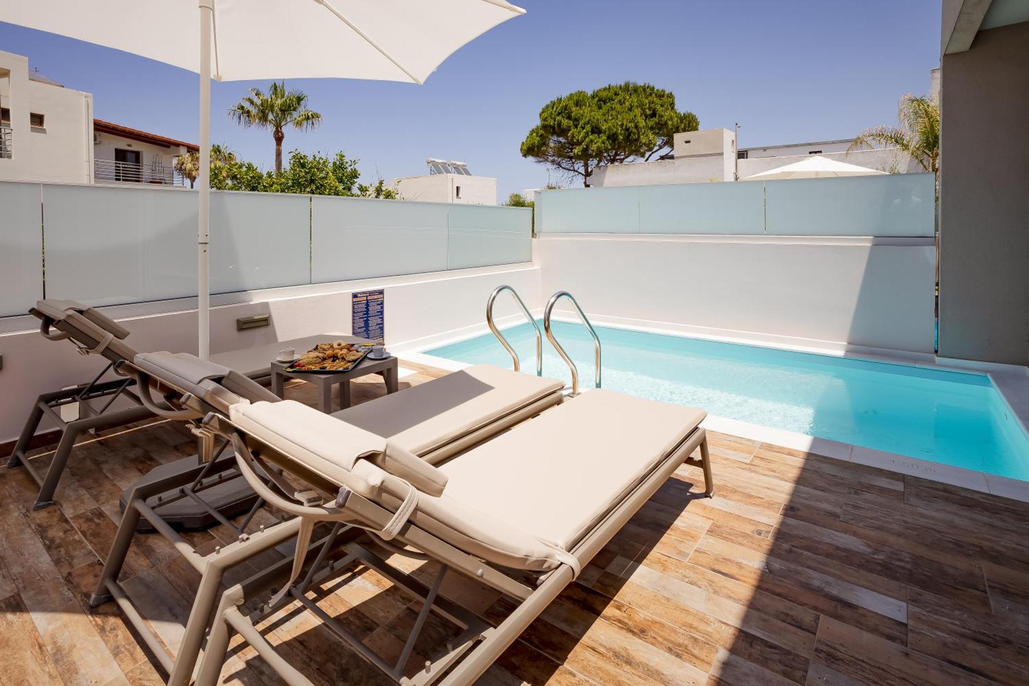 Sarpidon Suites Agia Marina Екстериор снимка